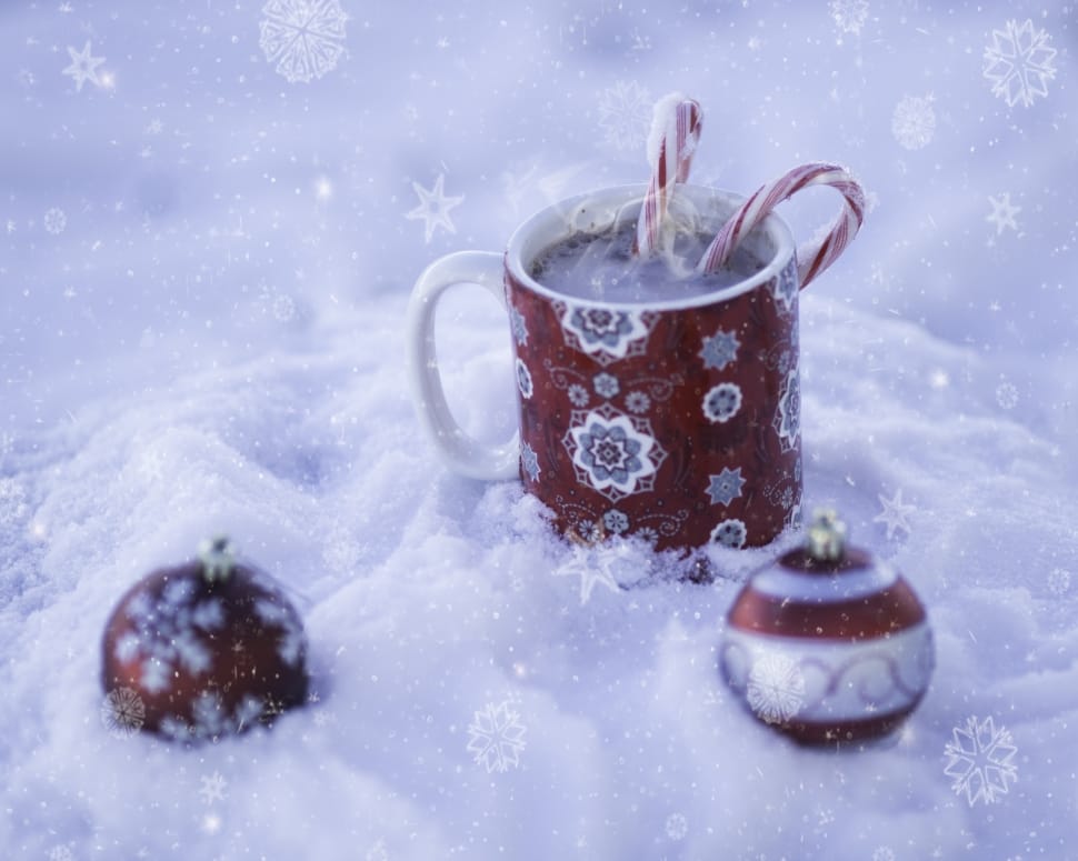 white and red ceramic mug and baubles preview