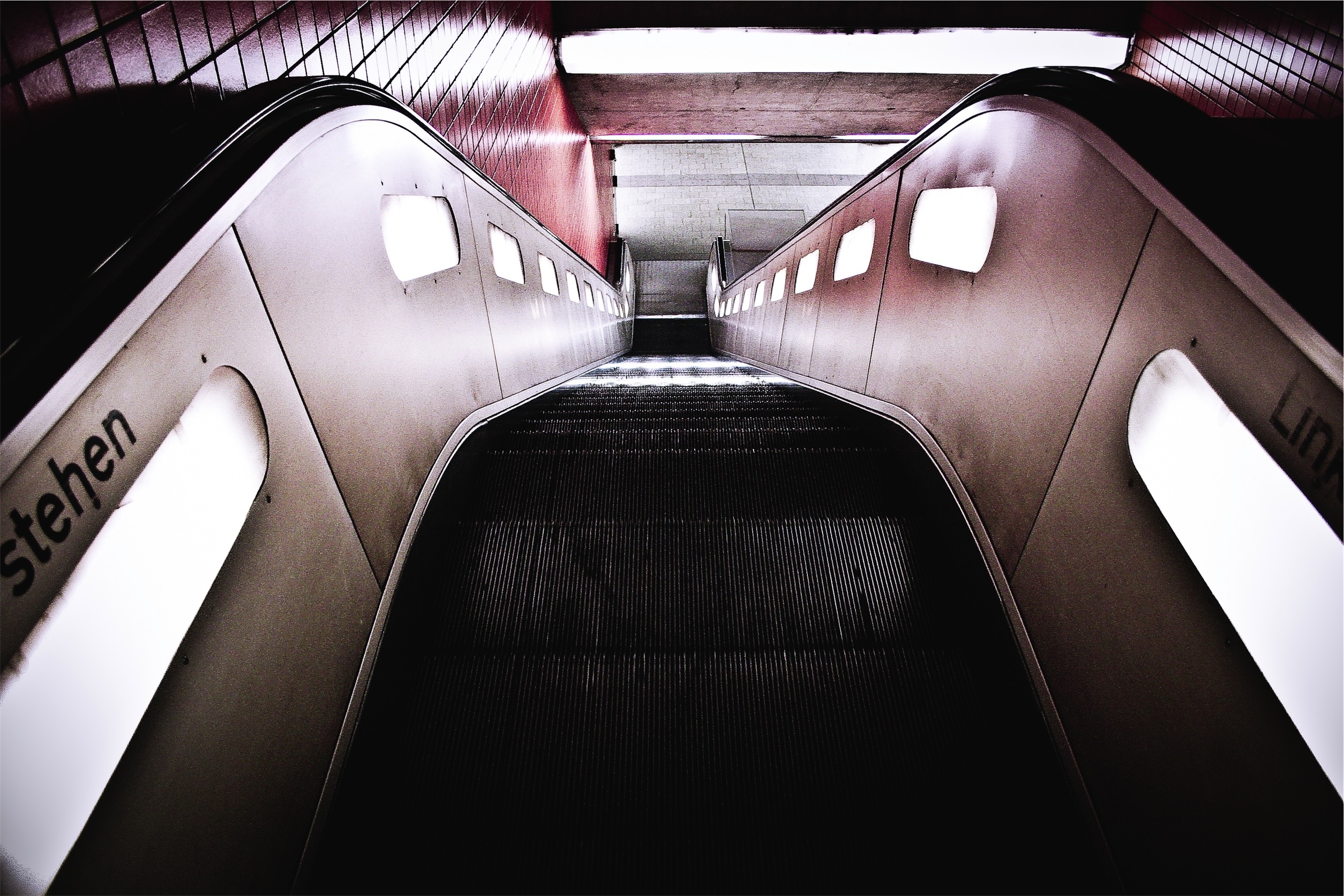 black and brown escalator