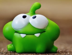 white and green frog plush toy thumbnail