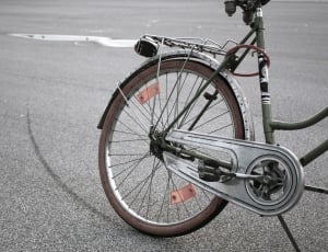 gray bicycle in gray concrete road thumbnail