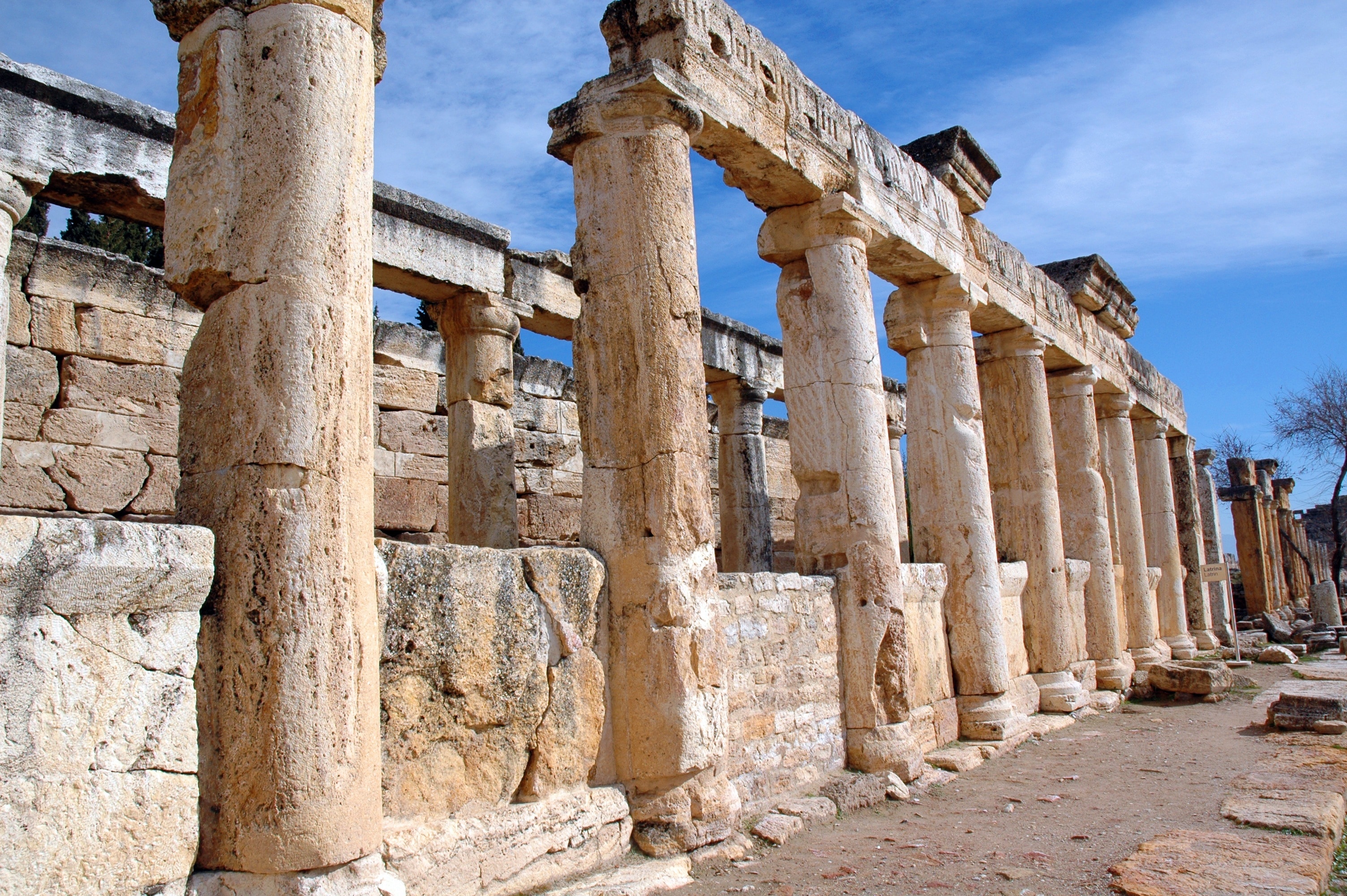 gray ancient concrete columns structures