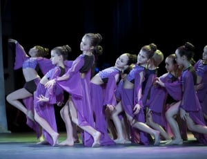 group of girls performing on stage thumbnail