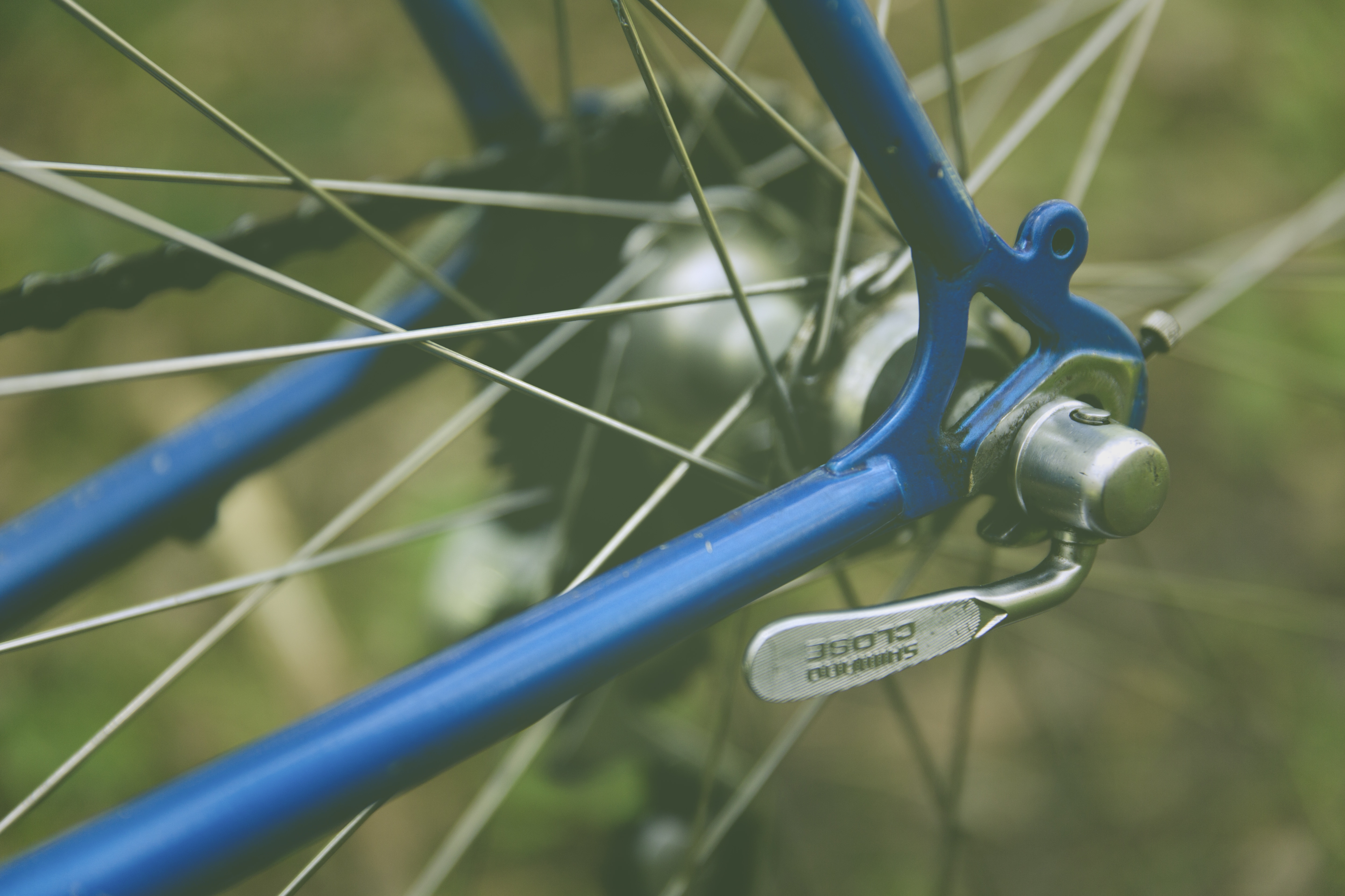 blue and silver bicycle component