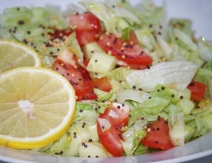 vegetable salad with two slice lemons thumbnail