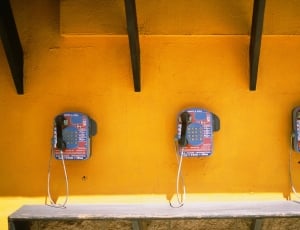 3 blue and black payphones thumbnail