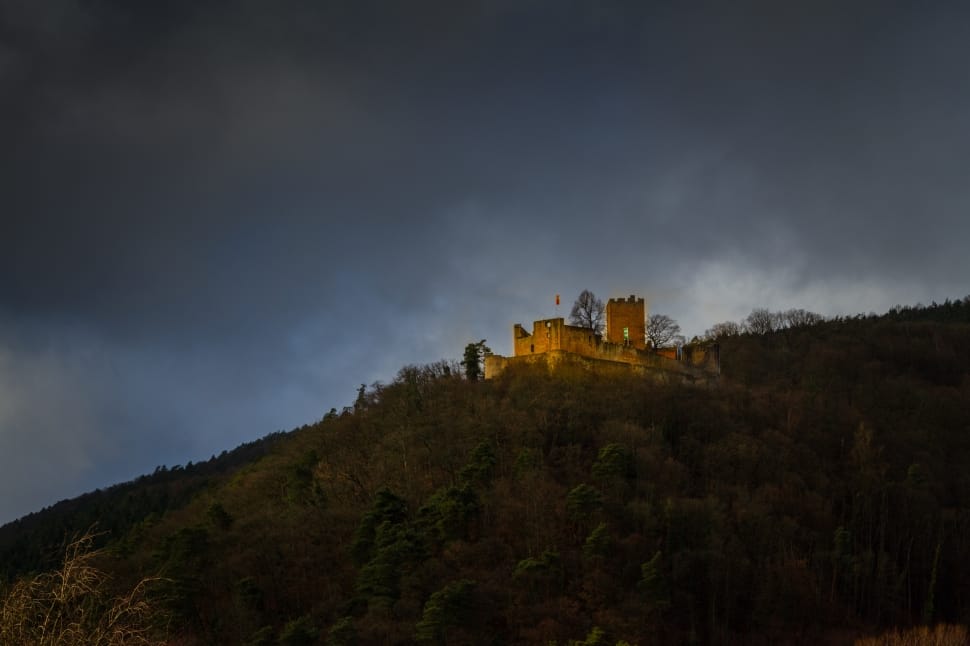 brown castle under cloudy sky preview