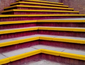 yellow and red painted concrete stairs thumbnail