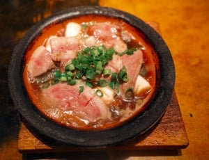 meat with soup and spring onions thumbnail