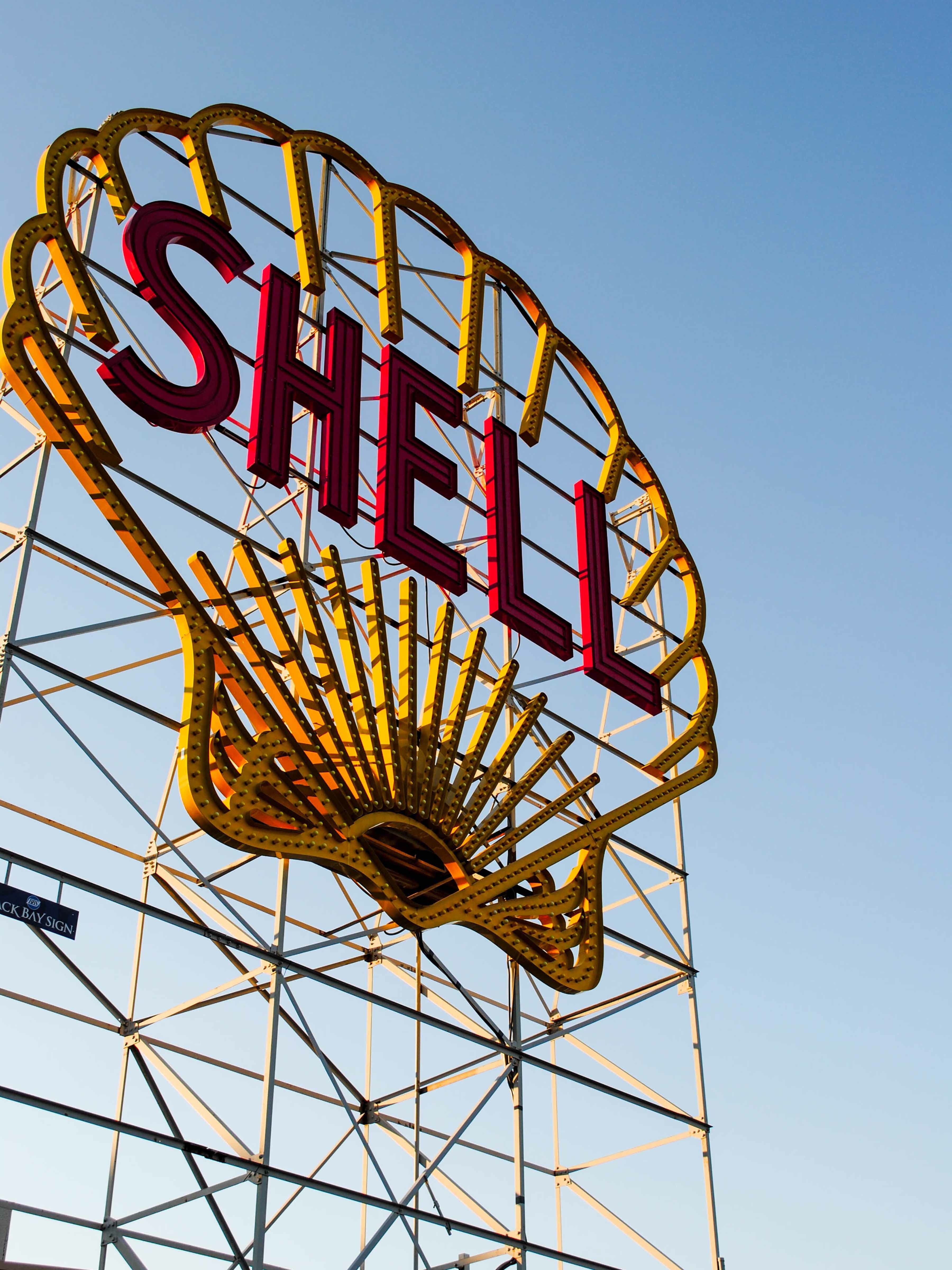 yellow and red shell signage