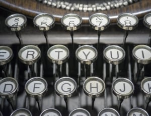 white and gray classic typewriter thumbnail