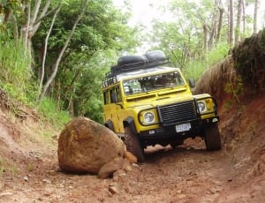 yellow jeep trailing on mountain thumbnail