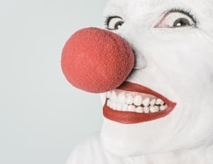 white and red clown face paint thumbnail