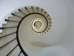 black handrails spiral stairs thumbnail
