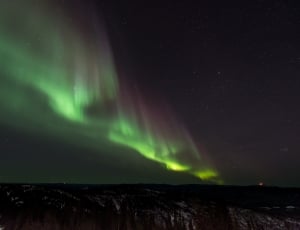 night times with aurora borealis thumbnail