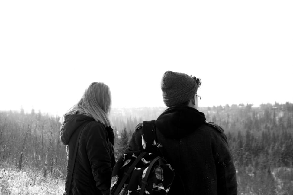 grayscale photo of man and woman standing preview
