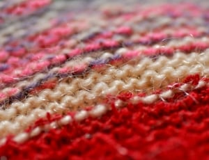 red beige and pink knitted textile thumbnail