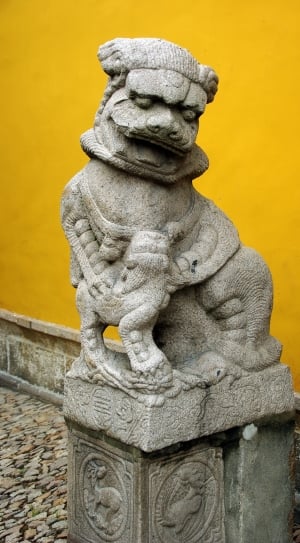 gray ceramic religious lion figurine thumbnail