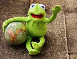 kurmet the frog plush to holding globe thumbnail