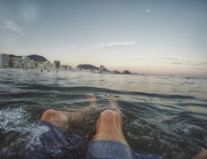 person swimming in a body of water thumbnail