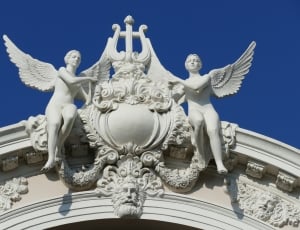2 white angel roof statues thumbnail