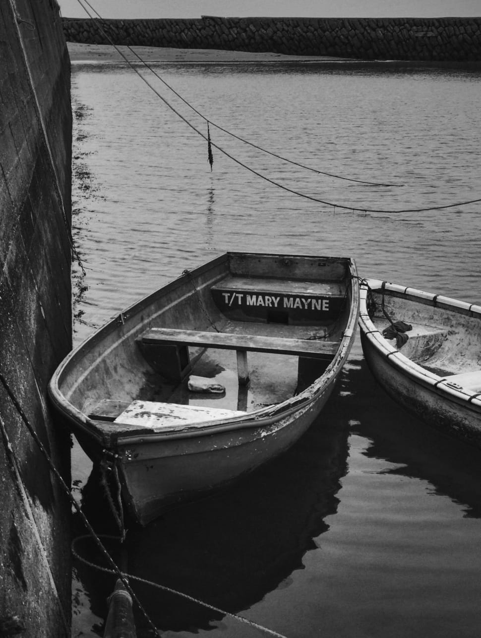 greyscale photo of canoe boat preview