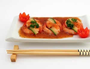 korean food served on white plate with chop sticks thumbnail