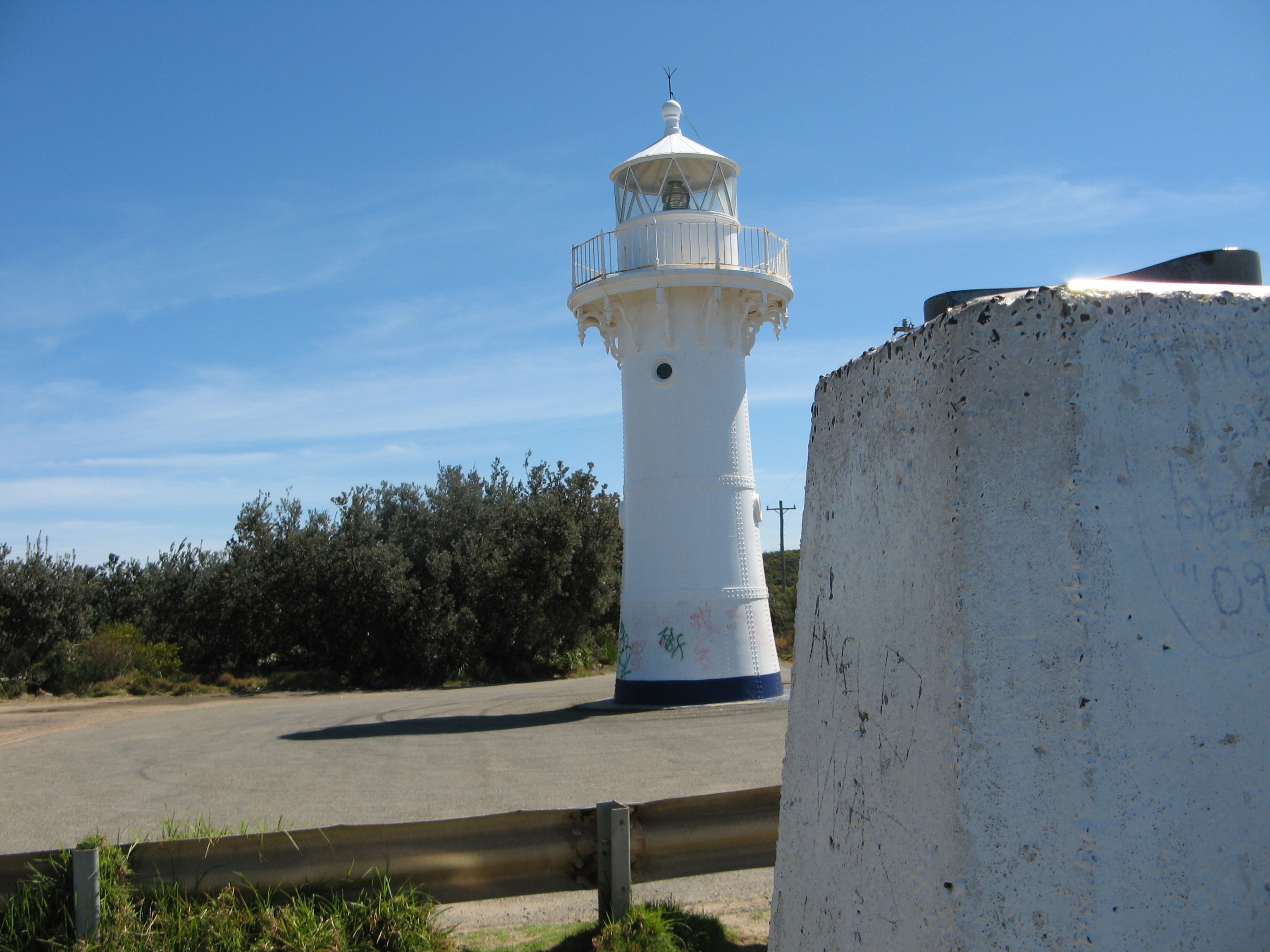 white lighthouse at daytime