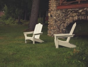 two white wooden adirondack chairs thumbnail