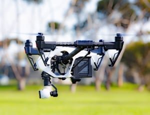 black and white rc quadcopter during daytime thumbnail