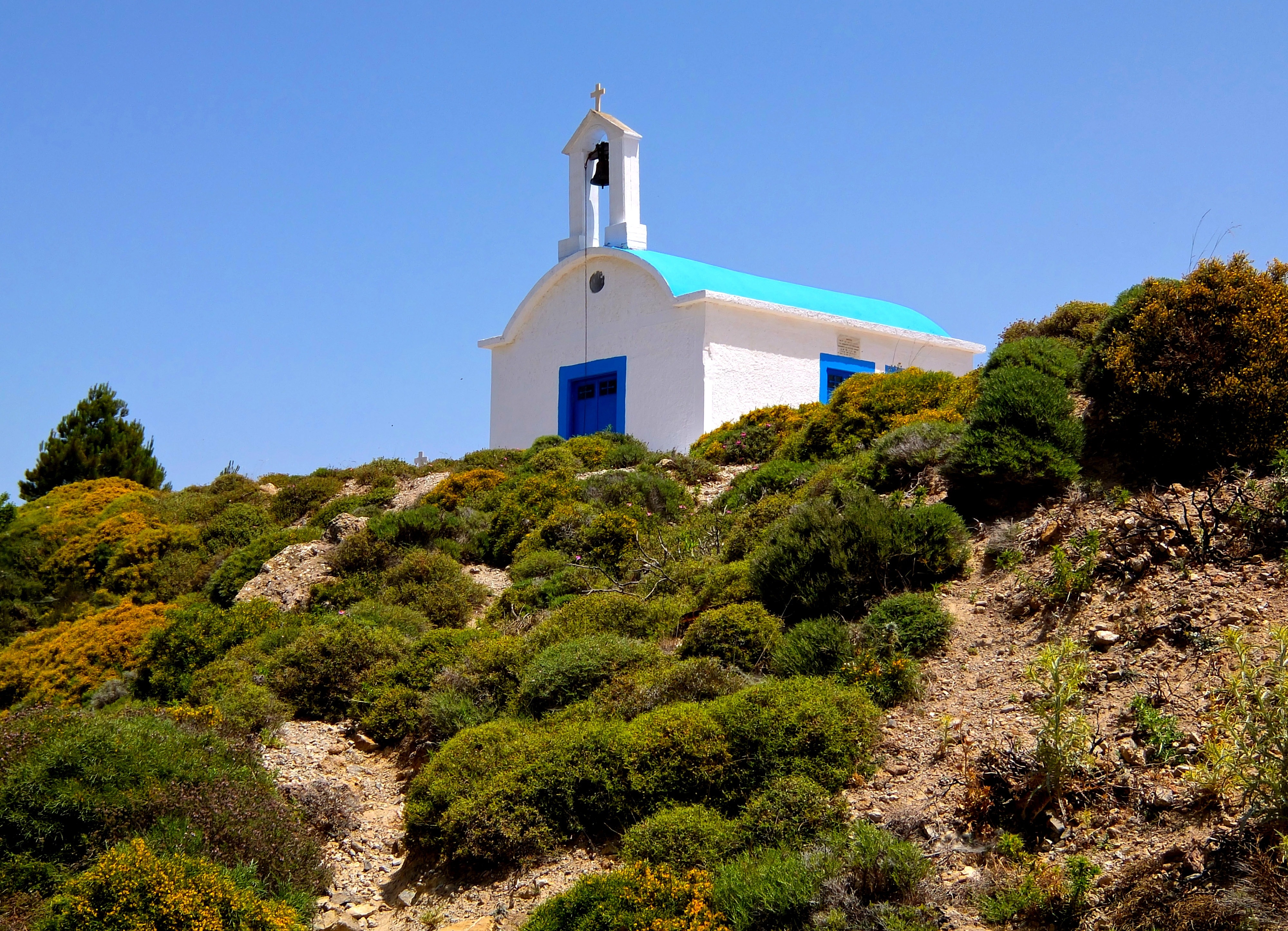 white and blue painted church
