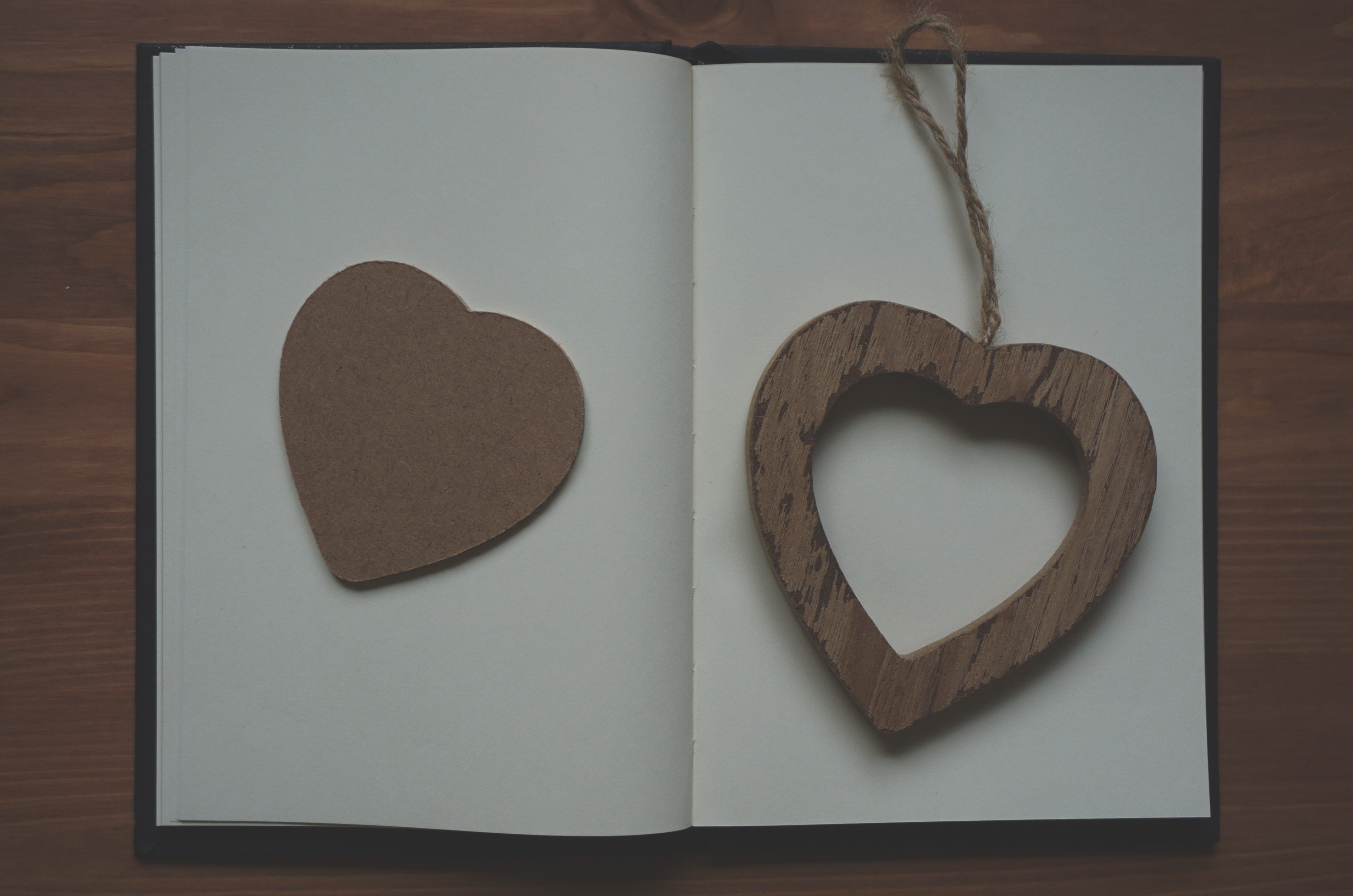 brown wooden heart cutout wall art