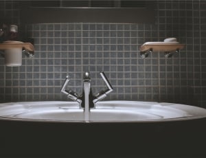ceramic round jetted drop bathtub and faucet thumbnail