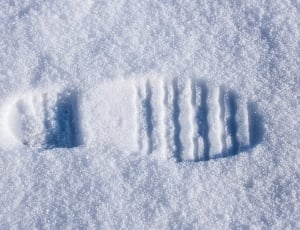 shoe step on snow thumbnail