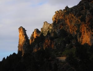 brown and green rock formation thumbnail