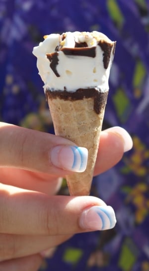 person holding ice cream thumbnail