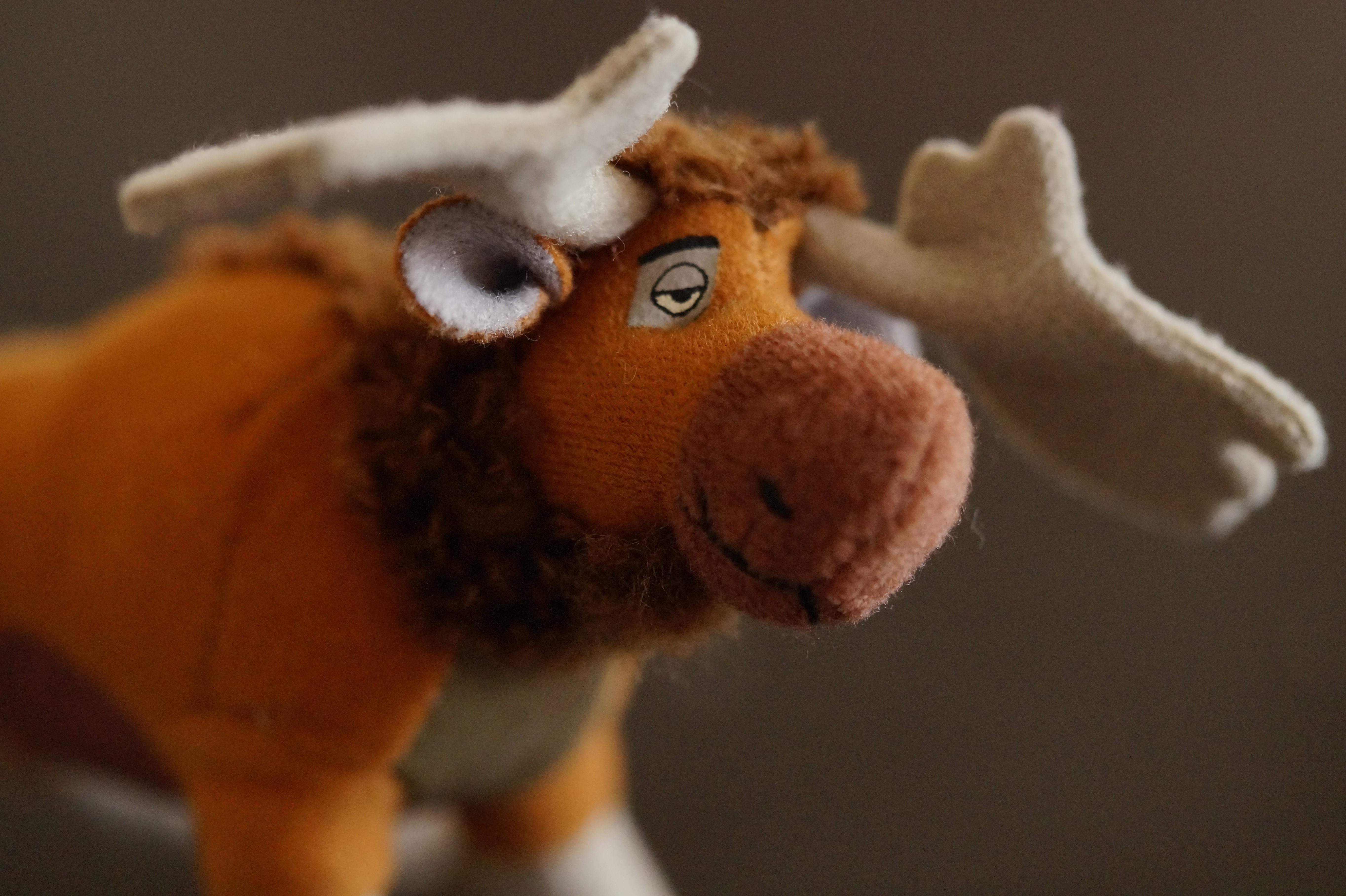 white and brown moose plush toy