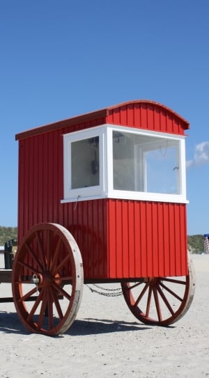 red and white wooden trailer thumbnail