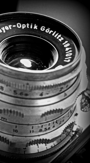 grey and black round camera lens thumbnail