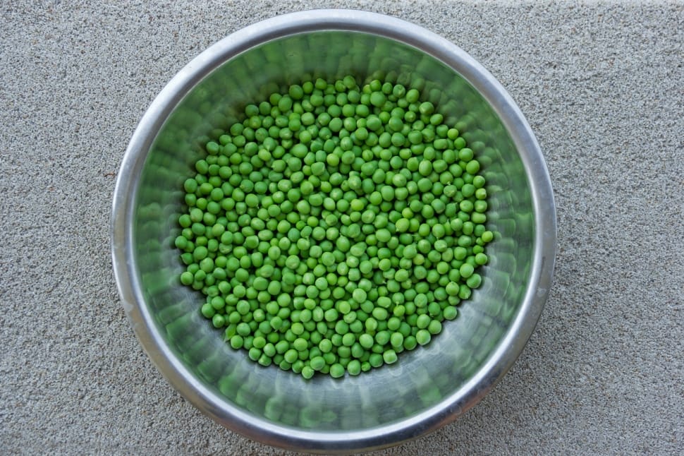 stainless steel round bowl with green peas preview
