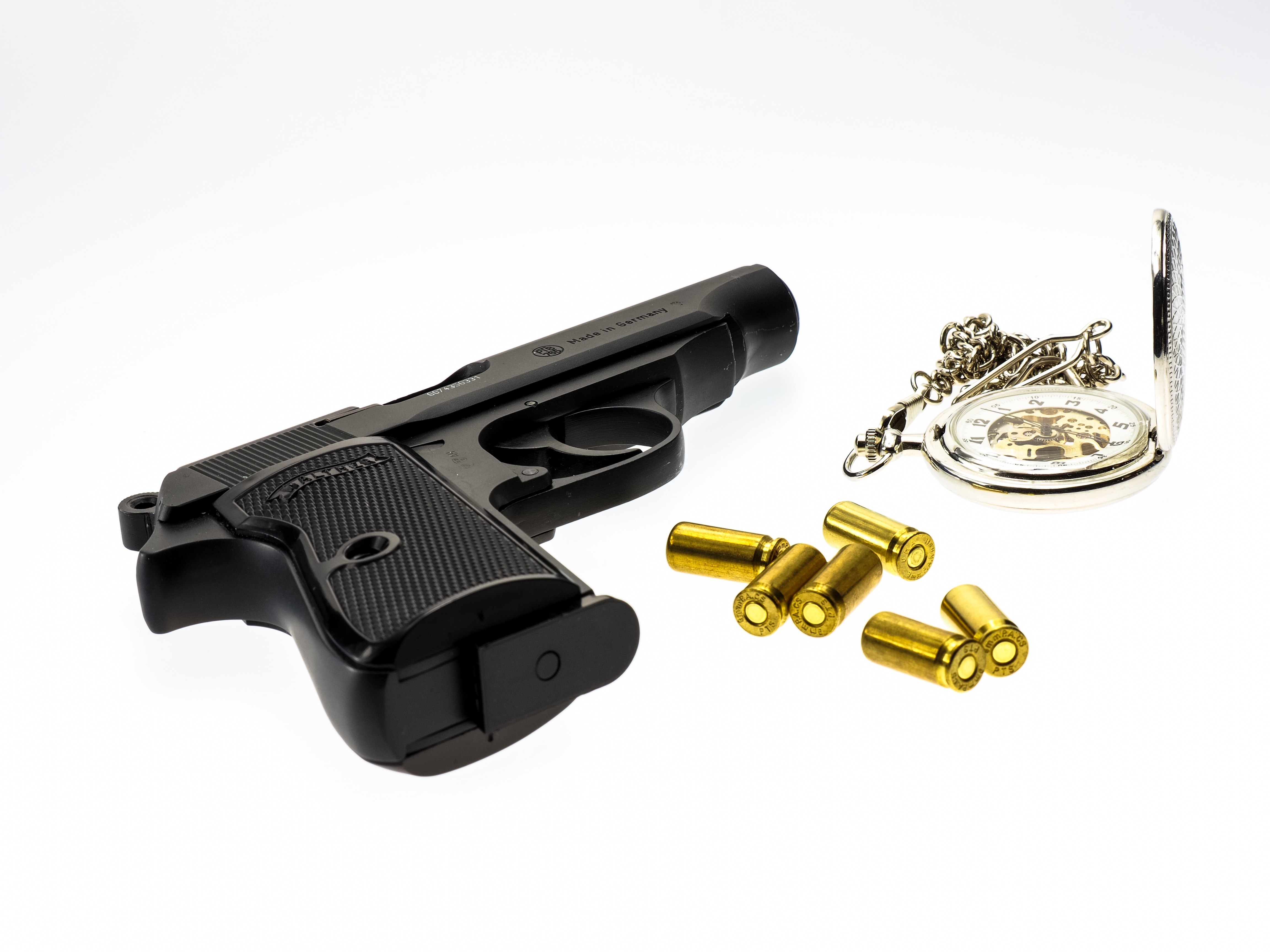black pistol and bullets