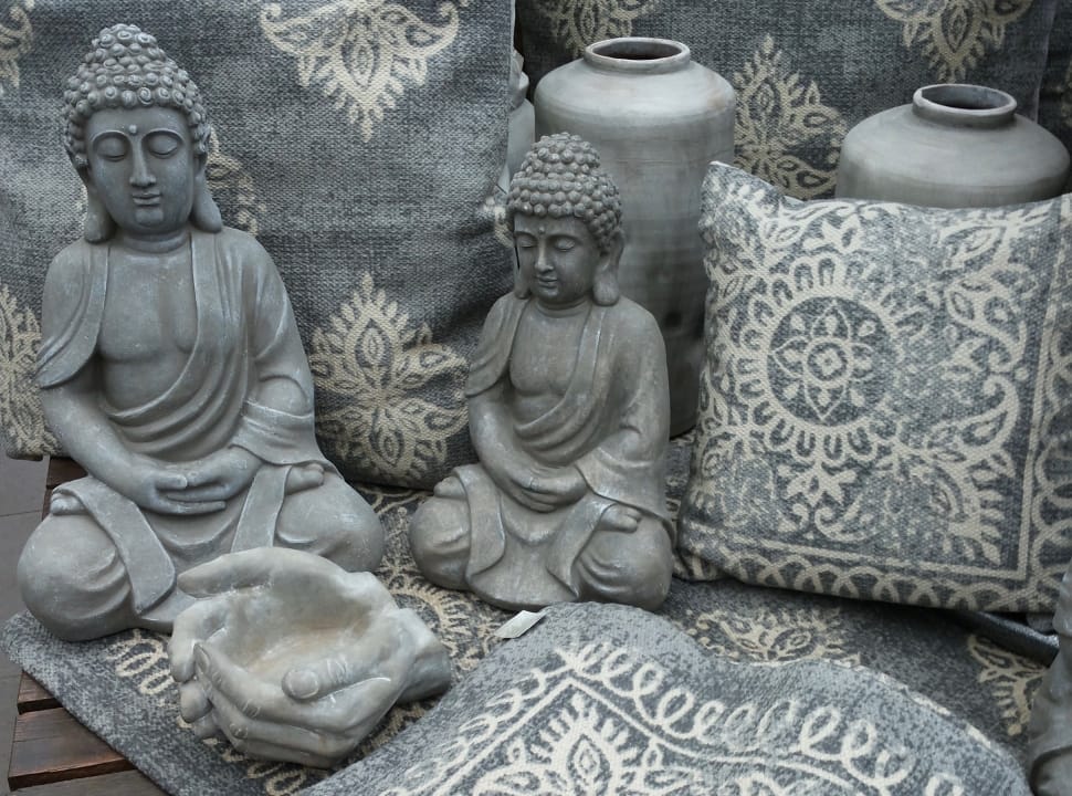 2 gray concrete buddha figurines preview