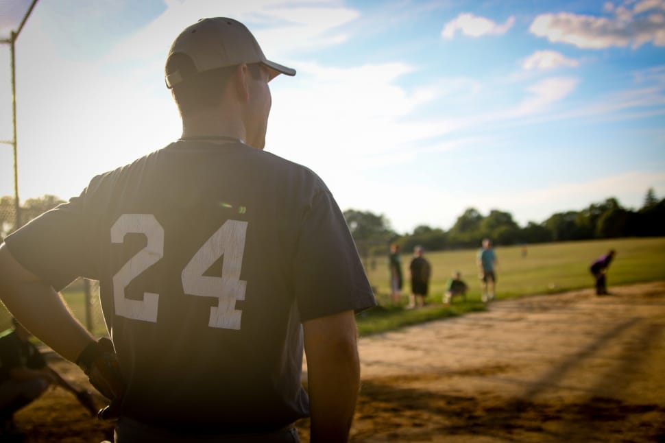 man wearing black 24 jersey shirt playing baseball preview