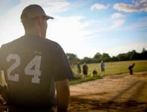 man wearing black 24 jersey shirt playing baseball thumbnail