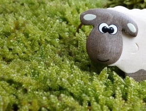 brown and white wooden lamb thumbnail