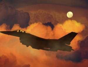 black fighter plane photo thumbnail