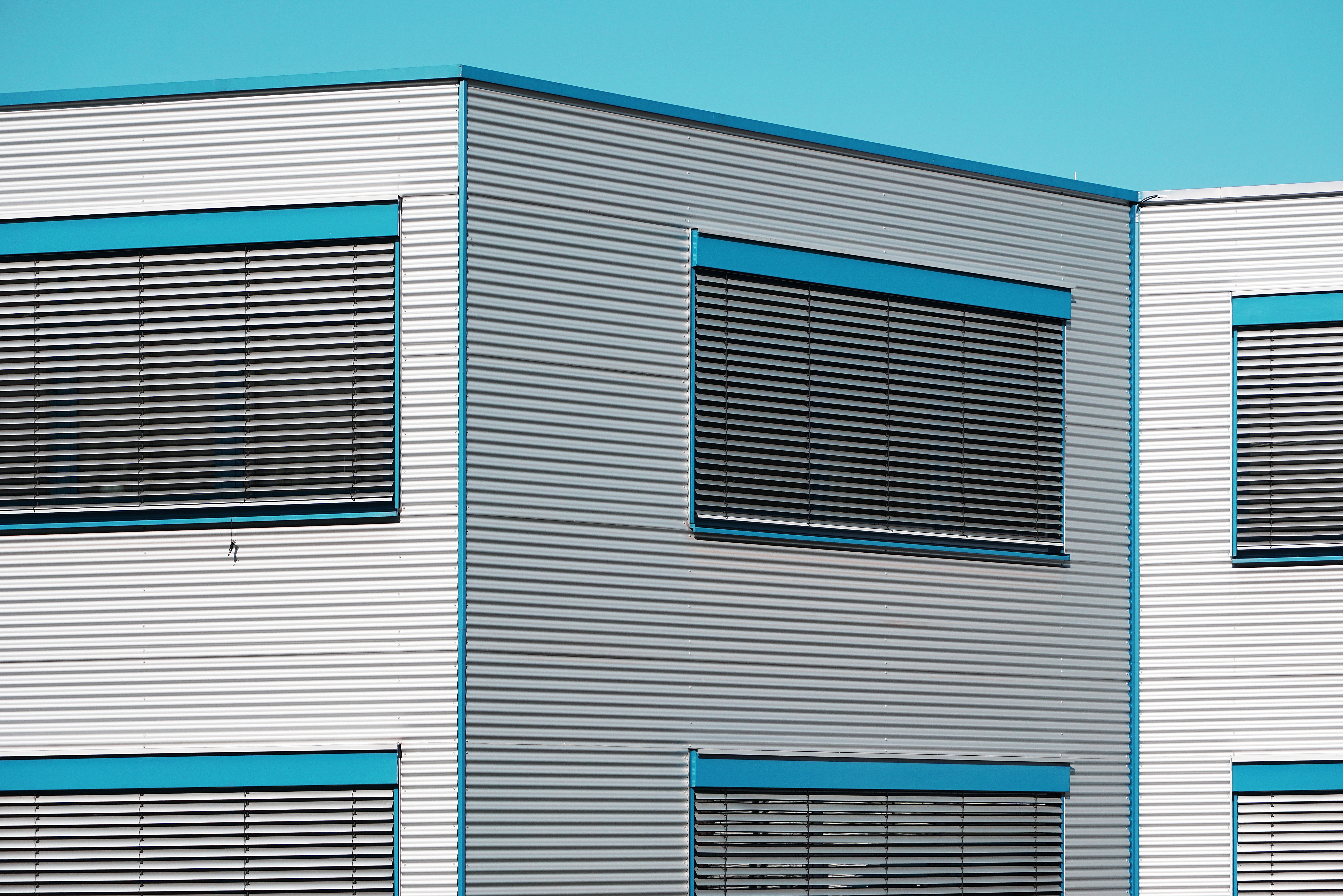 grey and blue buidling graphics