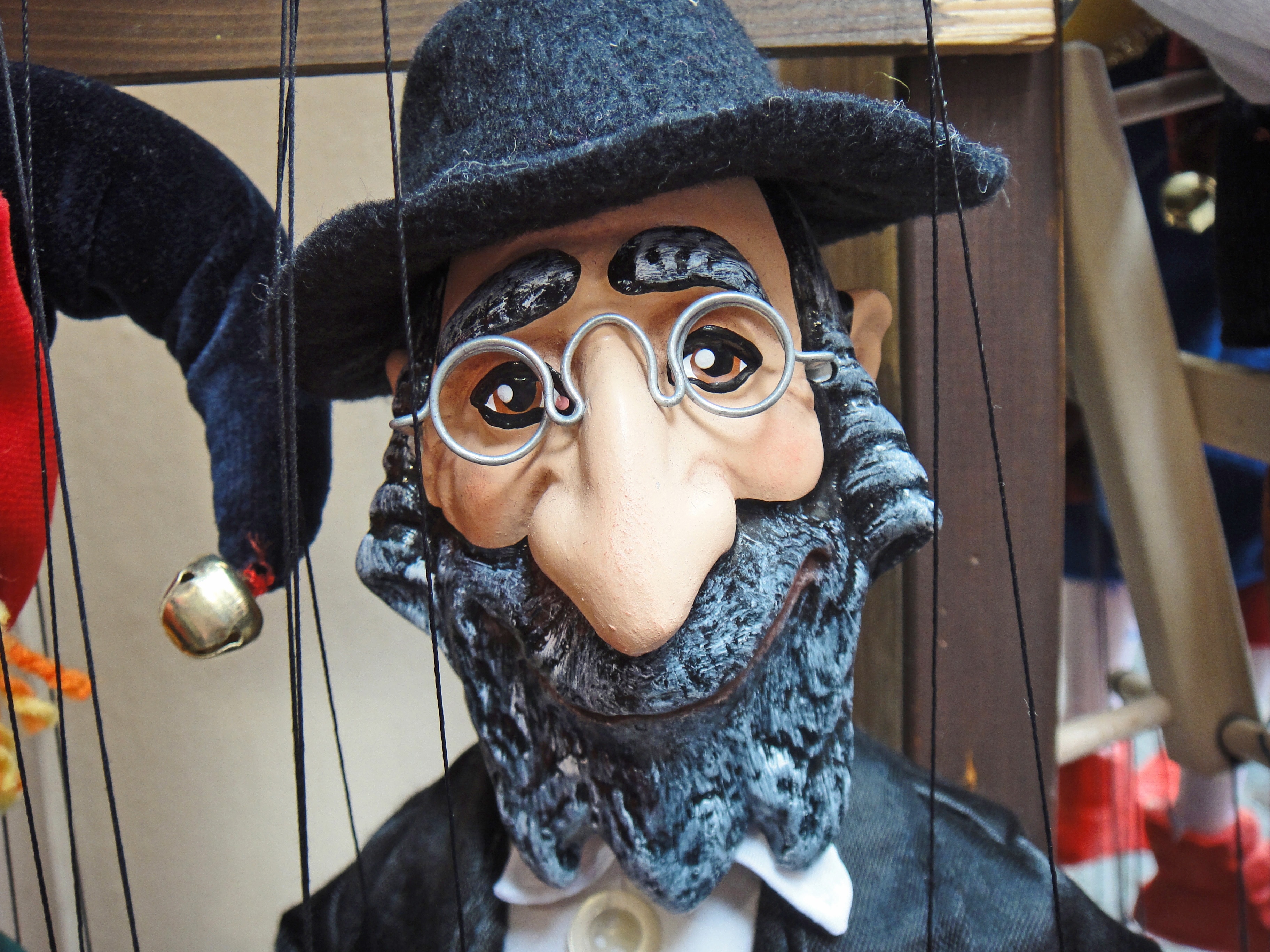 man wearing black hat puppety