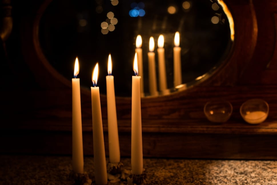 four lighted candles preview