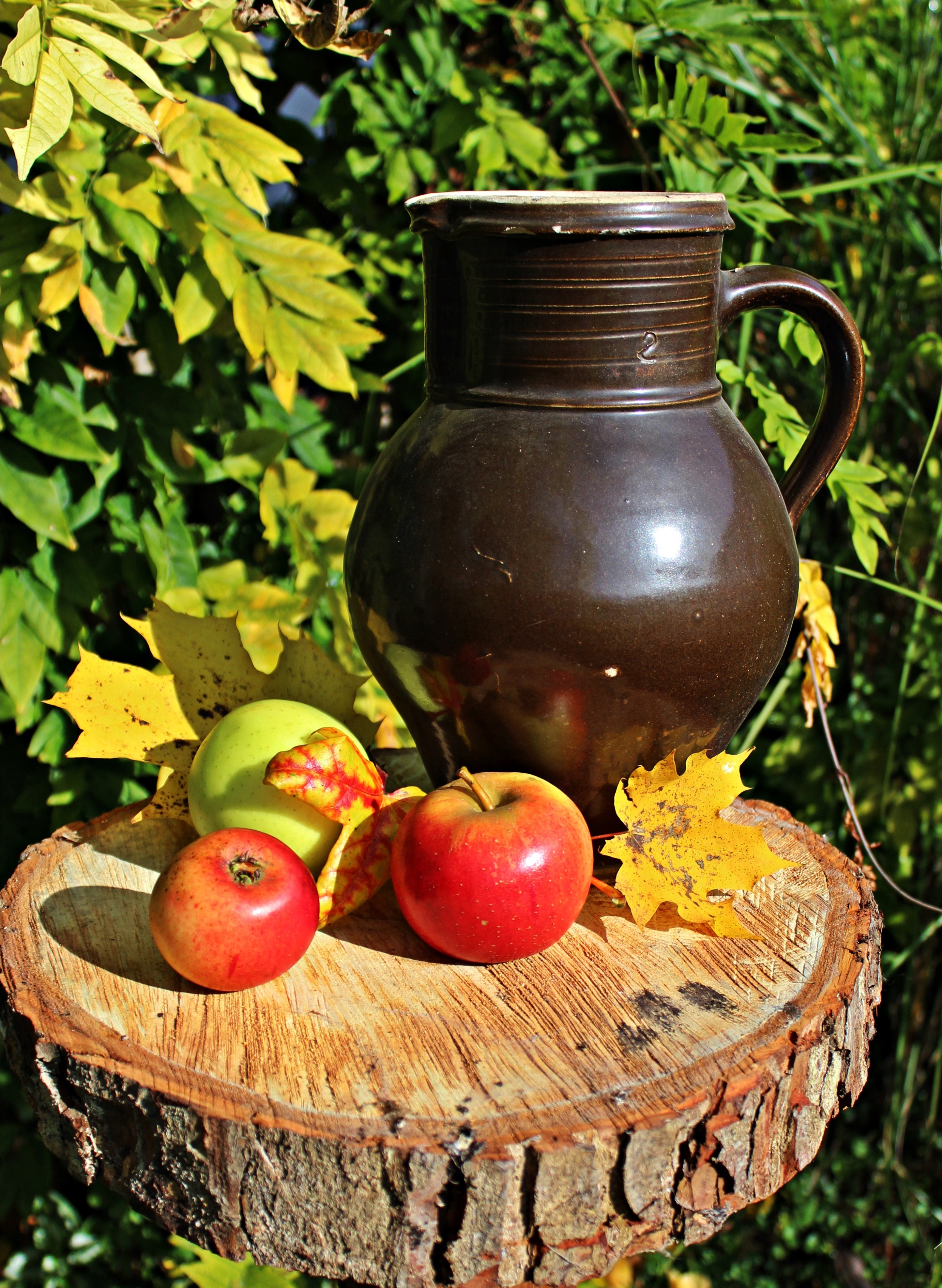 brown ceramic pitcher