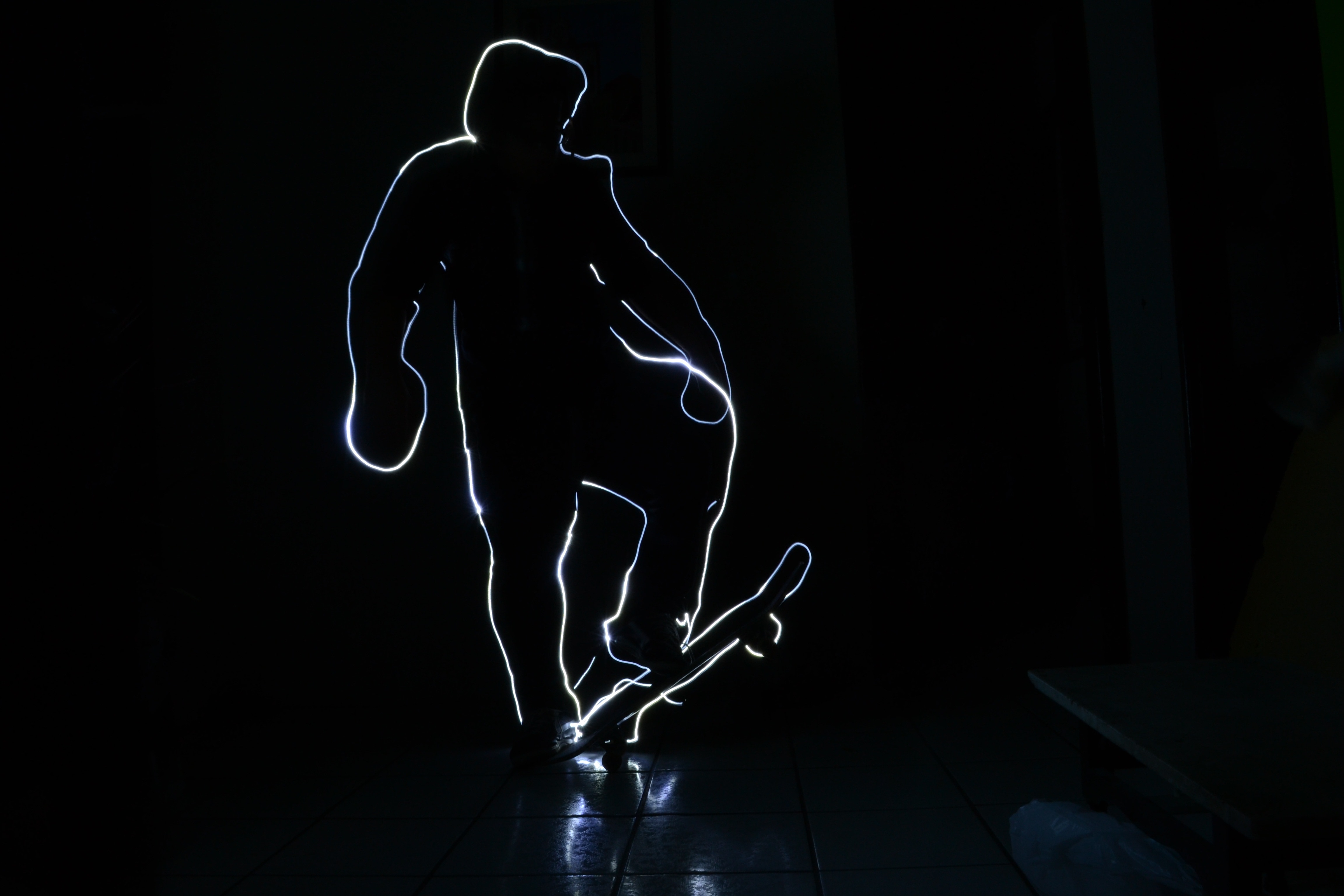 skating man neon light artwork